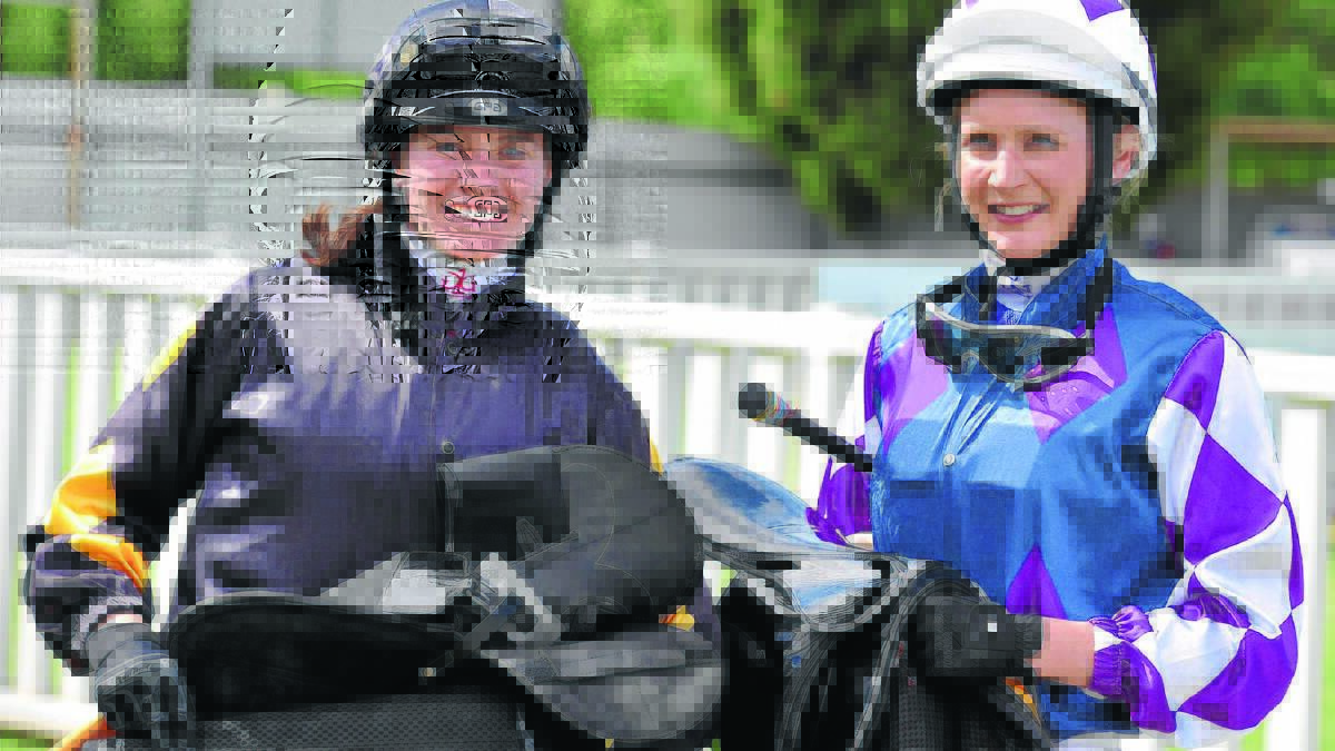 SHARING THE SPOILS: Visiting apprentice jockeys Jess Taylor and Claire Gee are all smilings after dead heating in a heat of the NSW Rising Stars Series at Murrumbidgee Turf Club yesterday. Pictures: Michael Frogley