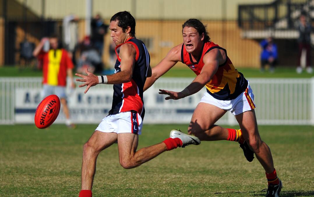 ON THE MOVE: Mitch O'Brien gets a kick away for Riverina Football League in the representative game against AFL Sydney under 23s at Robertson Oval in 2013. O'Brien has signed with Marrar.