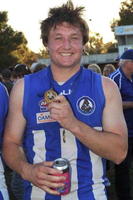 BEST ON: Sam Fisher shows off the Nitschke-Schmidt medal for best-on-ground in the Farrer League grand final. Picture: Michael Frogley