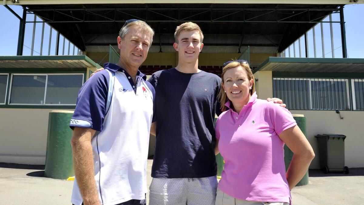 BIGGEST SUPPORTERS: Wagga's Dougal Howard, flanked by father Trevor and mother Christine, at Robertson Oval on Friday. Pictures: Les Smith