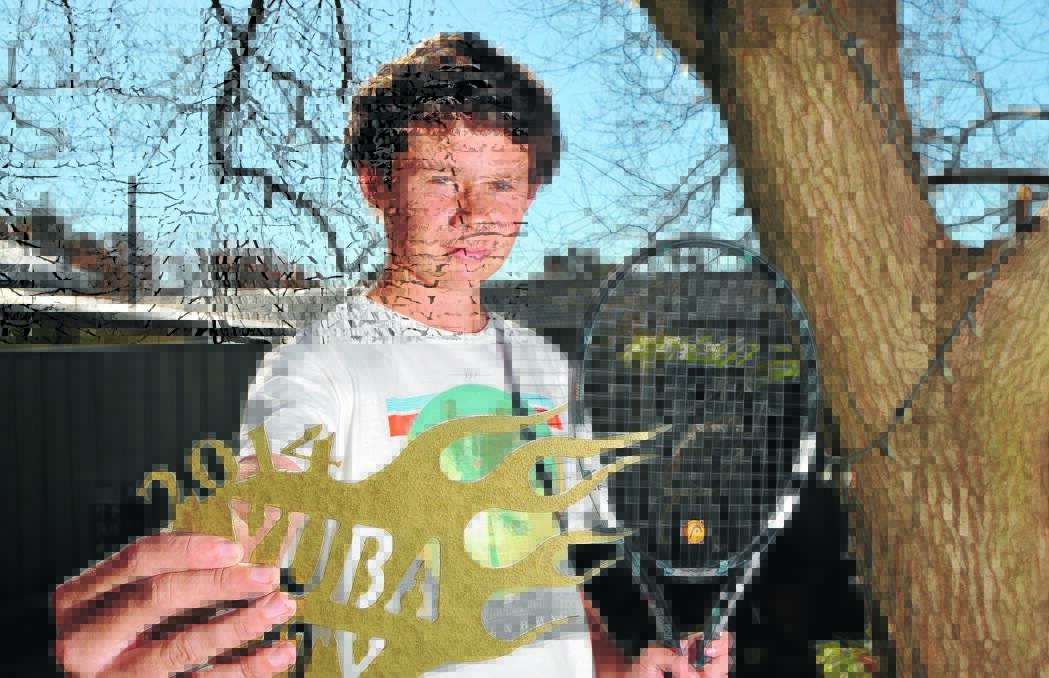 RISING STAR: Wagga tennis player Trey Murphy shows off the trophy he claimed when winning a tournament in the United States last month. Picture: Laura Hardwick