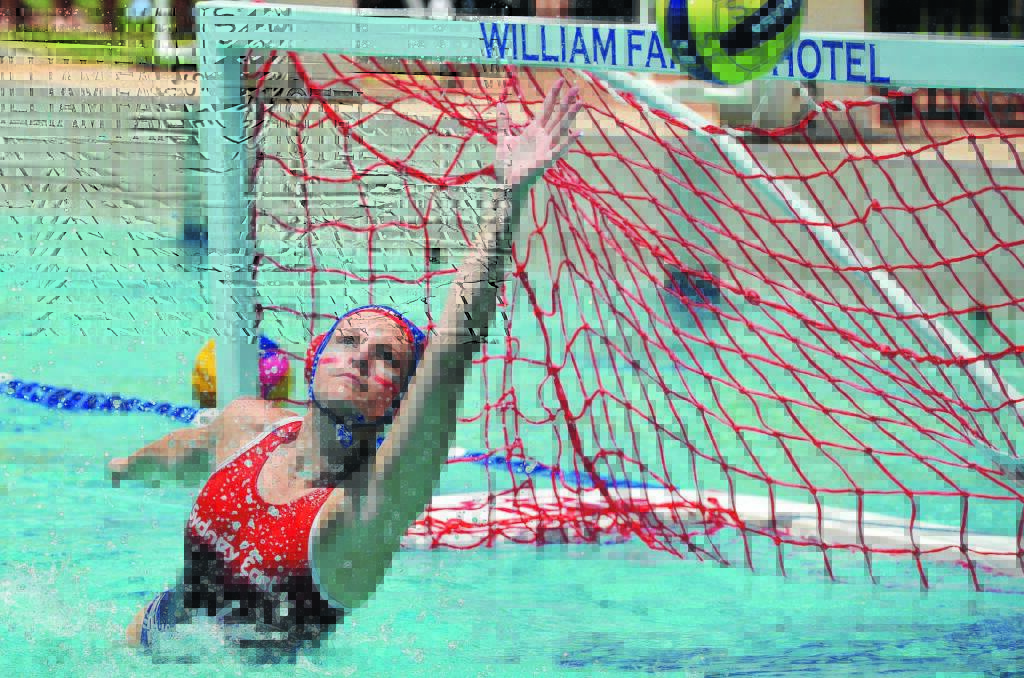STANDOUT PERFORMER: Sydney East's player of the final Chelsea Clarke attempts to stop a goal in the final of the NSW CHS Girls Water Polo Championships against Hunter at Oasis Regional Aquatic Centre on Friday. Picture: Michael Frogley