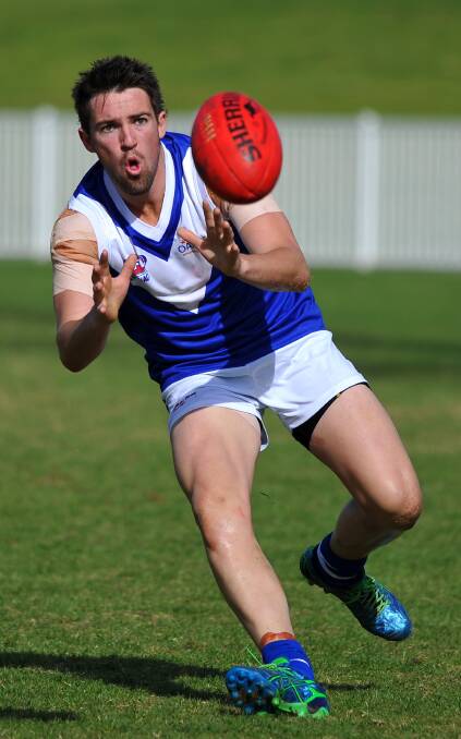 WELCOME BACK: Mitch Ward in action for Farrer League in the representative clash against Black Diamond League last year. 