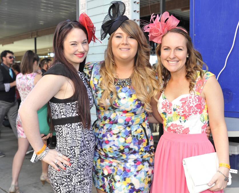 FASCINATING FASCINATORS: Giving Aggies Race Day a spectacular splash of colour on Saturday are (from left) Amy Lea-Bolger, from Wagga, Natalie Barnes (Cobar) and Bree Harris (Wagga). Pictures: Kieren L Tilly