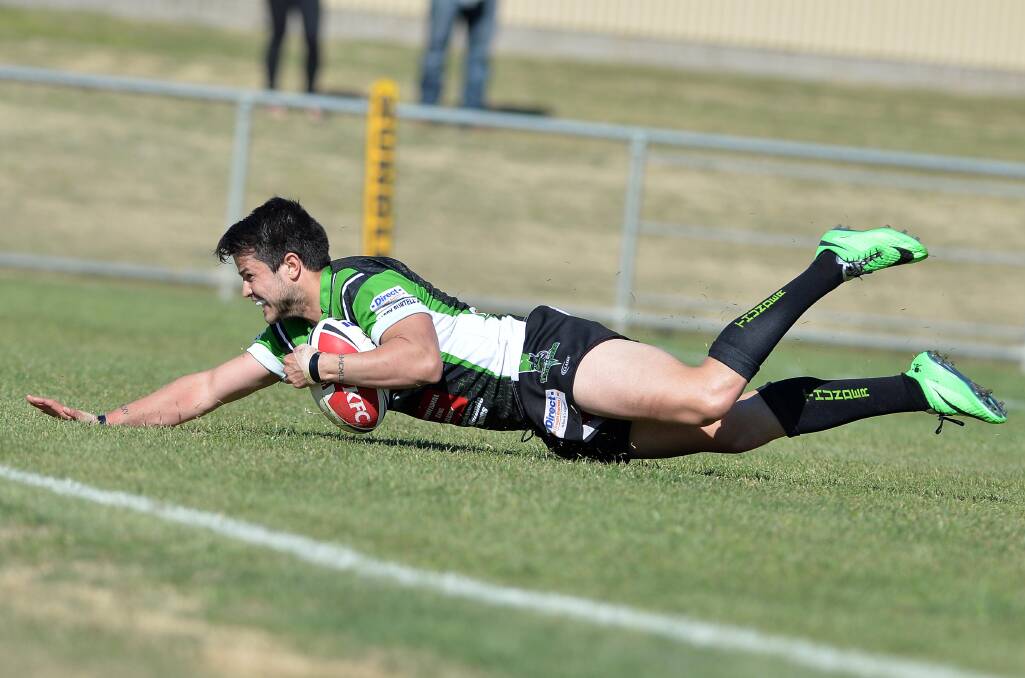 TELL STRIKE: Albury halfback Cameron Breust scores a try against Gundagai in the Group Nine preliminary final at Equex Centre on Saturday. Picture: Michael Frogley