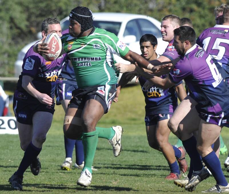 SURROUNDED: Tumbarumba prop Timoci Yauvoli is swarmed upon by Southcity defenders including Matt Ward, Pani Manawatu and Nathan Rose at Harris Park on Saturday. Picture: Les Smith