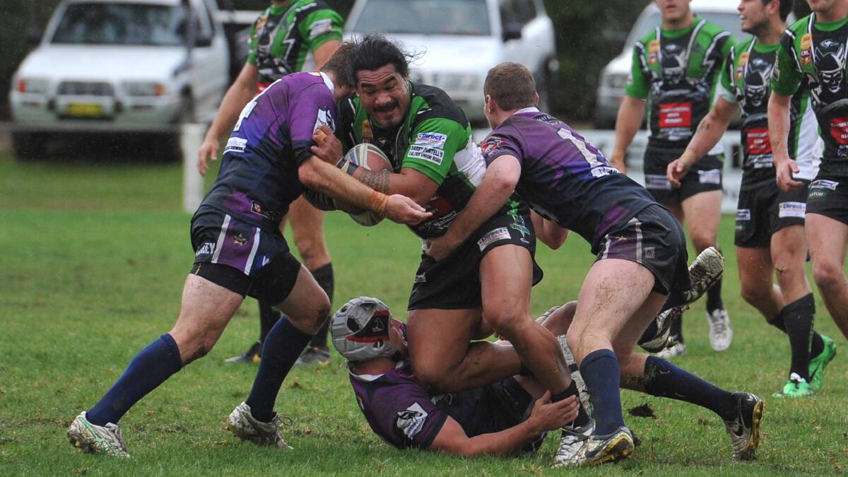 SURROUNDED: Albury prop Joe Silafau is swarmed on by Southcity defenders Tum Hurst, Tom Besgrove and Nick Skinner at Harris Park on Sunday. Picture: Laura Hardwick