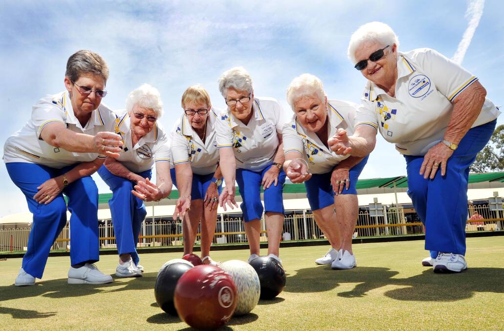 ACTION STATIONS: Rules Club bowlers (back from left) Joan Stair, Carol Freeman and Leonie Maher; (front) Fran Mahon, Michelle Henderson and Lyn Carroll get in the spirit of the Invitation Triples tournament at the Wagga club yesterday. Picture: Laura Hardwick