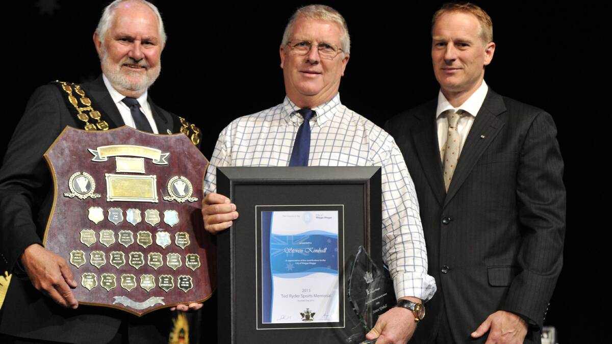 Wagga Rugby League president Steve Kimball receives the Ted Ryder Sports Memorial Award from mayor Rod Kendall and Australia Day ambassador Damian Candusso. Picture: Les Smith