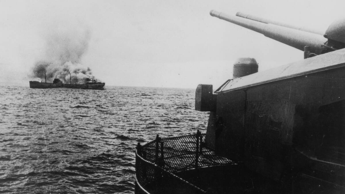 A view of the German battleship Bismarck firing on a merchant ship in the north Atlantic. The Bismarck was sunk after attack by the British fleet on 27th May 1941. Picture: Keystone/Getty Images