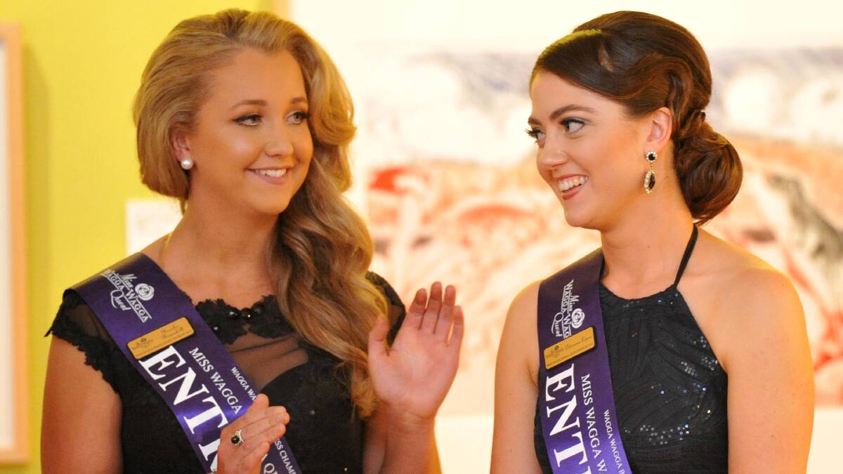 EMBRACED THE QUEST: Miss Wagga 2015 Adriana Lions is on a high as she is announced Miss Wagga, while contestant Brooke Brunskill applauds the decision. Picture: Michael Frogley