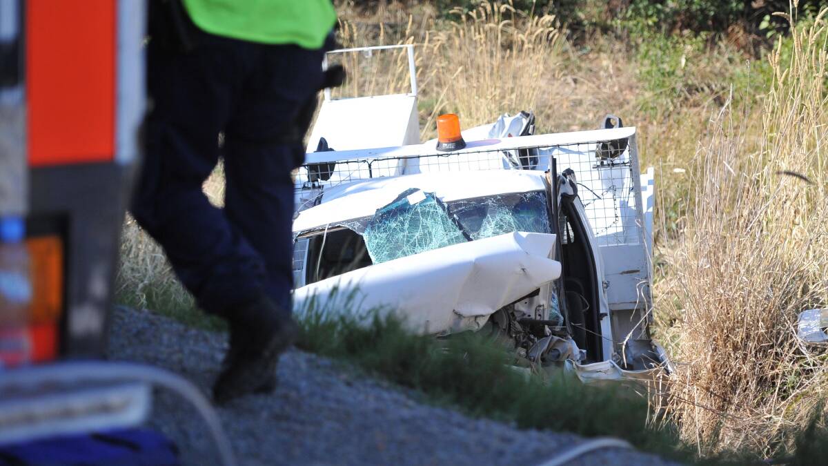 Destruction: A white utility drove into a culvert on the Tumbarumba Road near Book Book on Monday morning. The driver and the passenger are in a stable condition. Picture: Michael Frogley