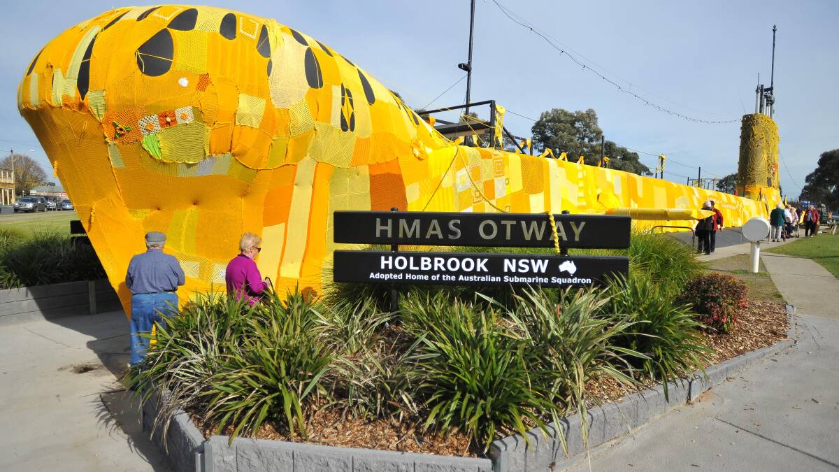 THIS WAY TO HOLBROOK: Tourists came from far and wide to see Holbrook's crocheted yellow submarine.