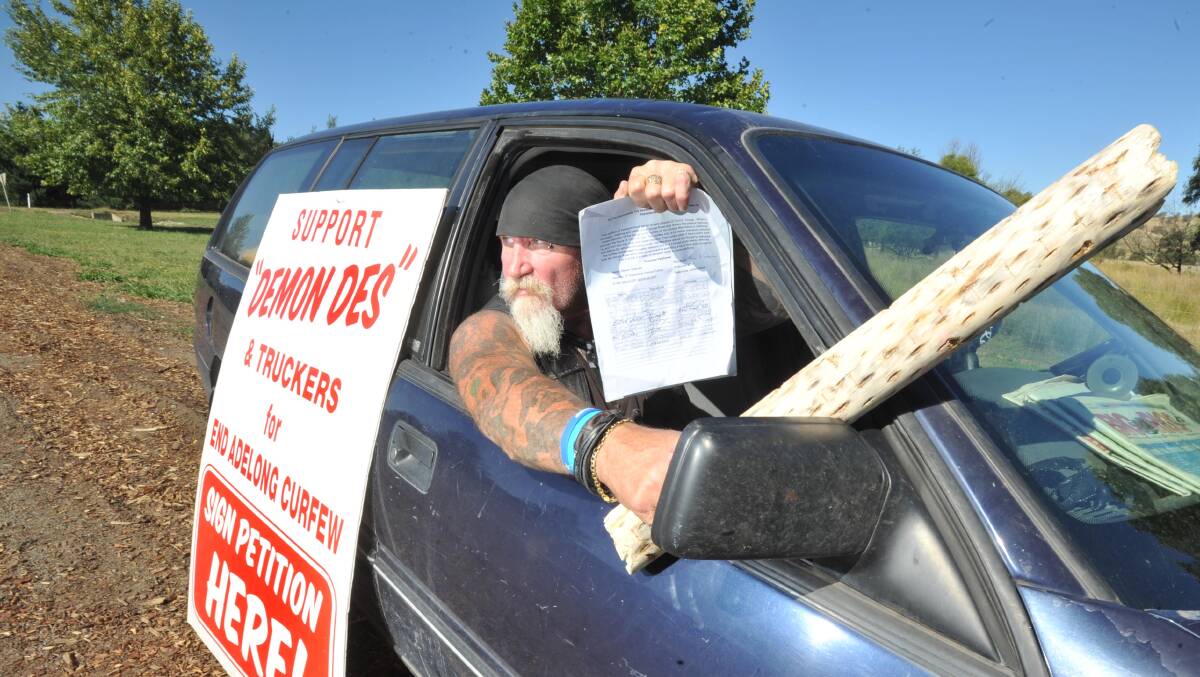 FIGHTER: Des "Demon" Downes has launched a campaign to lift the curfew on Visy truck drivers travelling through Adelong at night. Mr Downes plans to present the petition to the state government attached to a log. Picture: Kieren L Tilly
