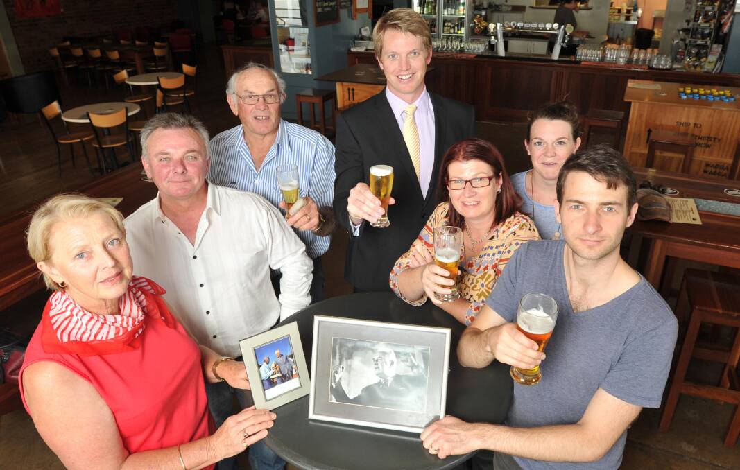CHEERS TO GOUGH: (From left) Robin McPherson, Luke Grealy, Col McPherson, Dan Hayes, Emily Marsh, Sophie and Tim Kurylowicz will raise a glass to Gough Whitlam next week. Picture: Michael Frogley