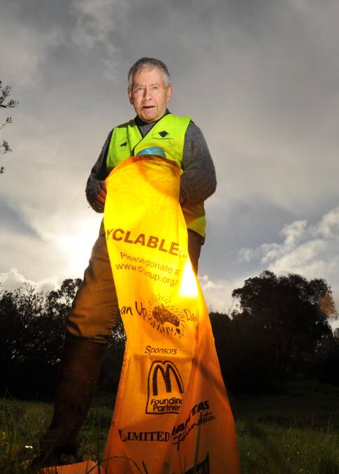 TIDY-UP: Chairman of the Wagga Tidy Town Sustainable Community Committee John Rumens prepares the clear some rubbish ahead of Clean up Wagga Day tomorrow. Picture: Michael Frogley