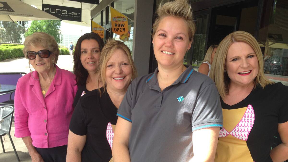 Nancy Hester, Kerryn Mellen, Denise Flack and (right) Jodie Morrow gift $1500 to (front) Nicole Burgess who was recently diagnosed with breast cancer. Picture: Brodie Owen
