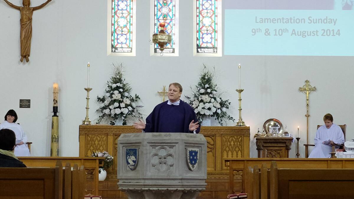 Father Michael Armstrong issues a public apology at a service at St Johns in Wagga yesterday. Picture: Michael Frogley