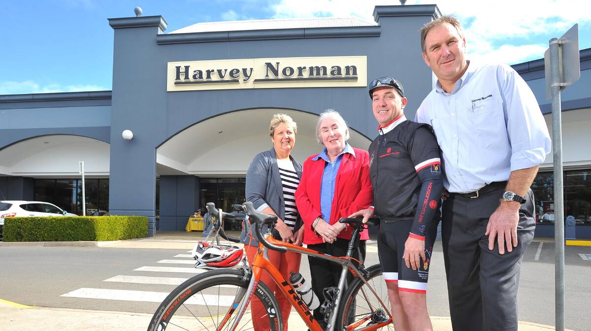  Wagga Harvery Norman Furniture, Bedding and Flooring franchisees Lesley Gleeson (left) and Paul Gleeson (right) with Wagga Ronald McDonald House executive officer Deborah Braines and cyclist Andrew Bradley before the 800km fund-raising ride on Monday. Picture: Kieren L Tilly