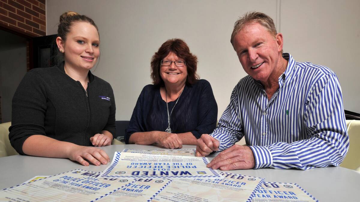 Chambers Whyte Printers' graphic designer Megan Steele, Rotary club of Wagga president and police awards committee chair Jo Wilson and committee member and DA deputy editor Peter Mahoney discuss the upcoming gala presentation. Picture: Michael Frogley