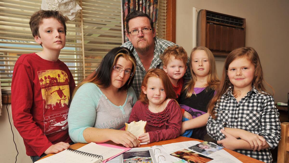 Theo Burton, Rebbecca Fullwood, Elaina Fullwood, Thomas Burton, Christopher Fullwood, Jenniffer Fullwood and Emmilly Fullwood face homelessness, unable to secure a suitable rental property. Picture: Kieren L Tilly