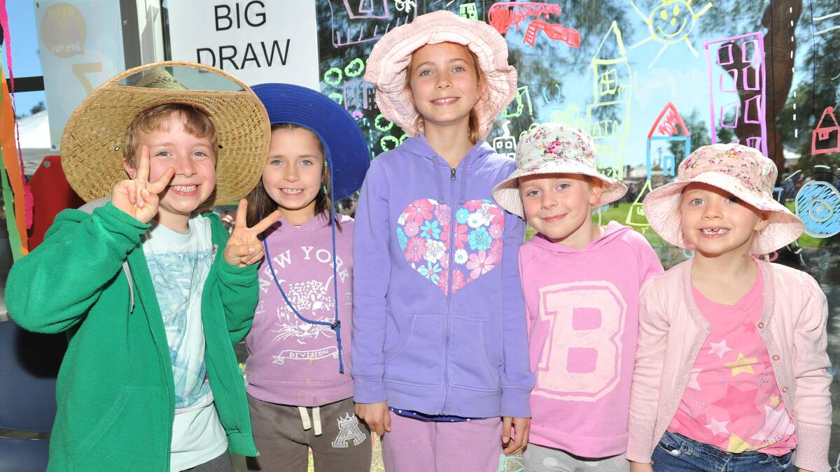 COUSIN FUN Cousins Edward Clark, 9, Maggie Clark, 7, Lily Clark, 11, Charlotte Clifton, 7 and Poppy Clifton, 6,  have fun at Little Big Day Out. Picture: Laura Hardwick 
