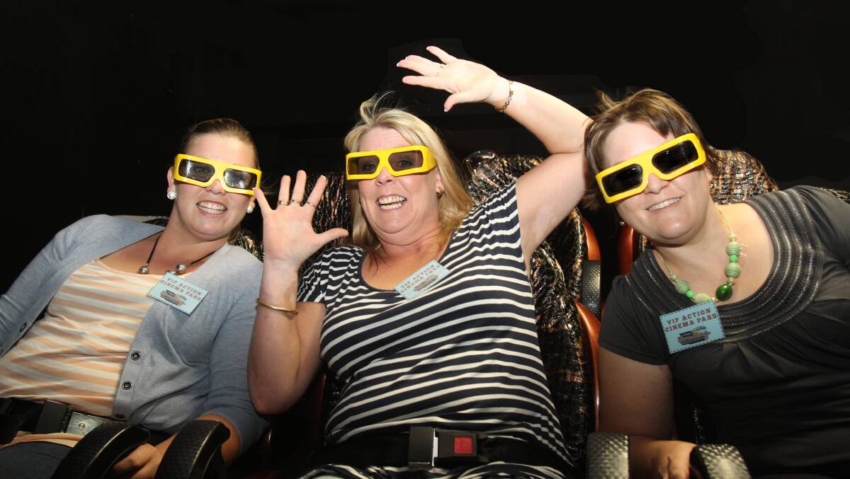 BUCKLE UP: Nikki-Lee Power, Vicki Moran and Kirsty Fordham enjoy a ride at the Wagga Bowling and Entertainment Centre. Picture: Olivia Shying 