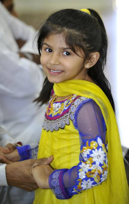 COLOURFUL CELEBRATION: Wagga's Chelsea Amin, 4, embraces her cultures at the Indo-Australian Friendship Day. Picture: Les Smith