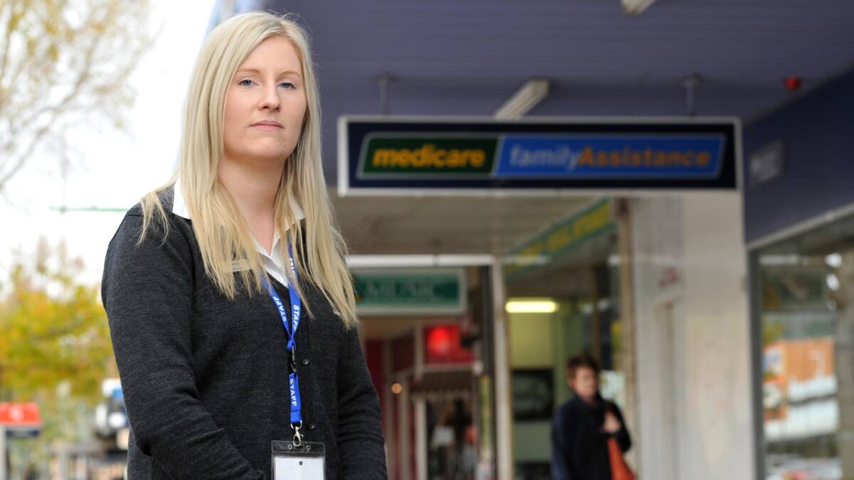 NOT HAPPY: Summit Discount Pharmacy manager Pamela Cochrane was instrumental in developing a petition to stop the amalgamation of Medicare and Centrelink services. She was unsuccessful. 