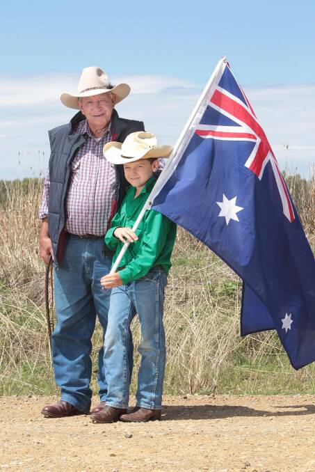 TRUE BLUE: Wagga veteran livestock man Don "Jingles" McKenzie and grandson Jamison George, 9, celebrate all things Australian.  Picture: Kieren L Tilly 

