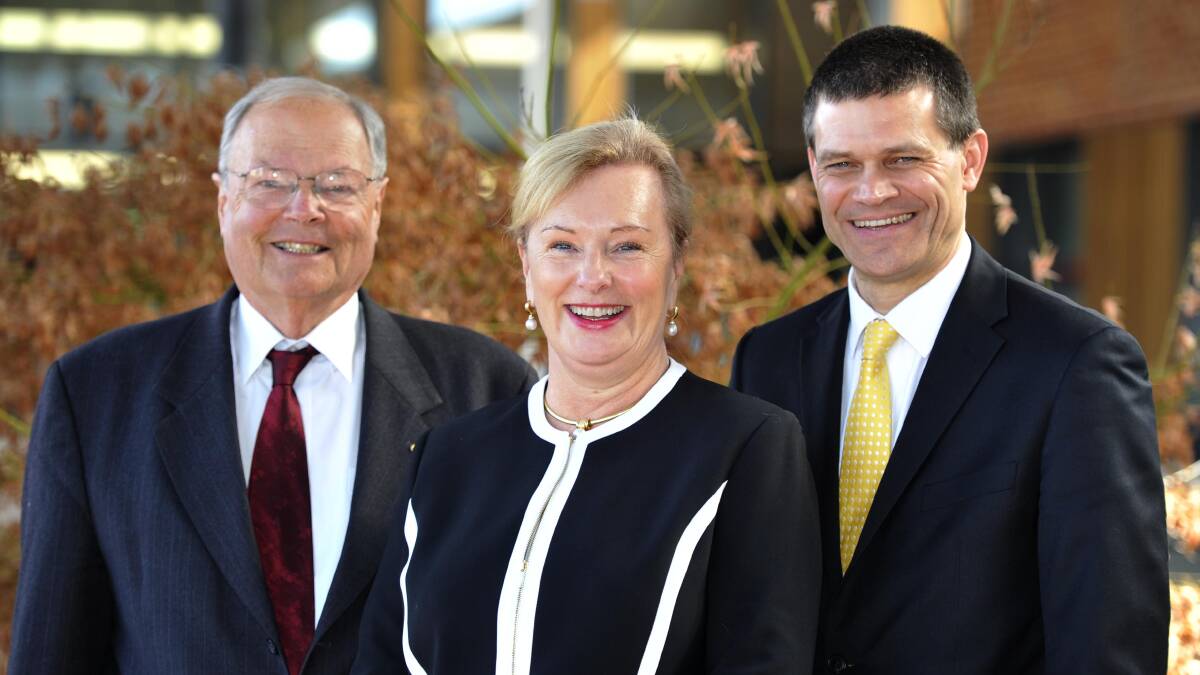 Incoming Charles Sturt University chancellor Michele Allan (centre) with her predecessor Lawrie Willett and vice-chancellor Andrew Vann. Picture: Les Smith
