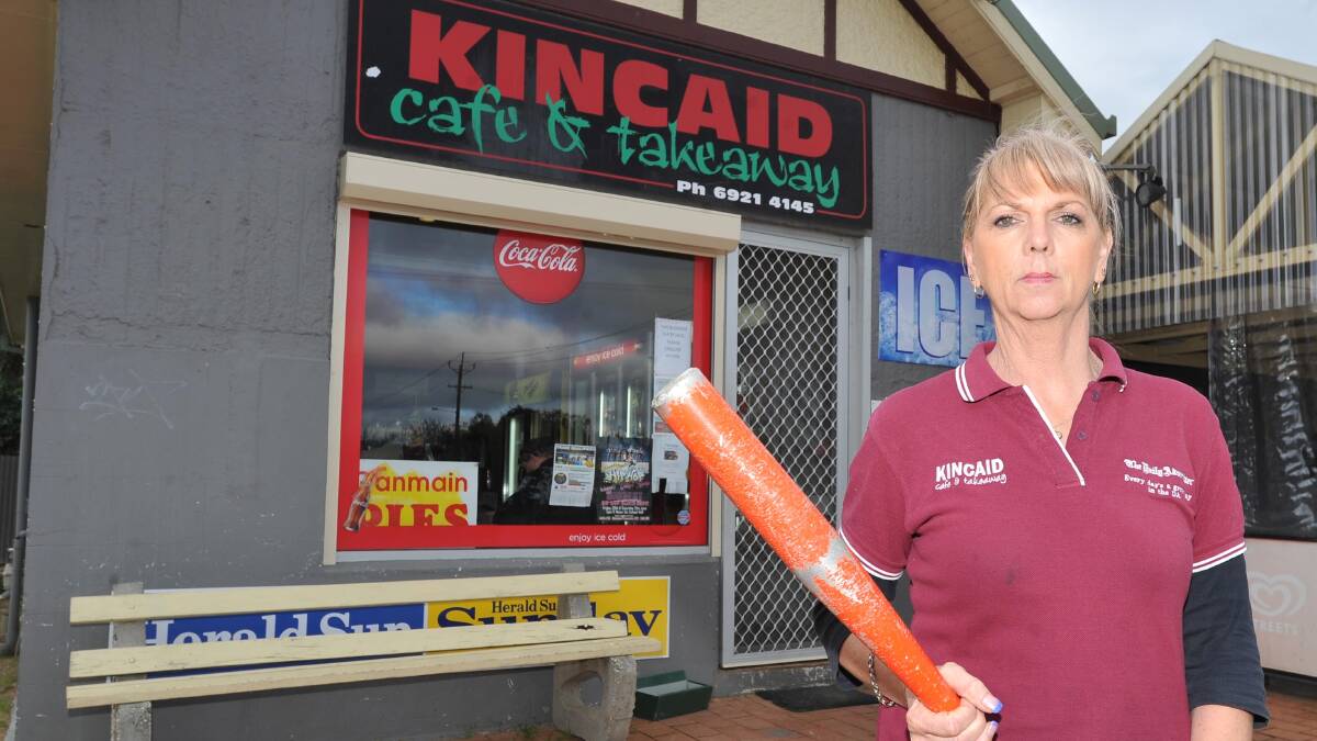Kincaid Street Cafe and Takeaway owner Lyn Taylor used a baseball bat to chase away a robber armed with a knife last Friday. Picture: Laura Hardwick