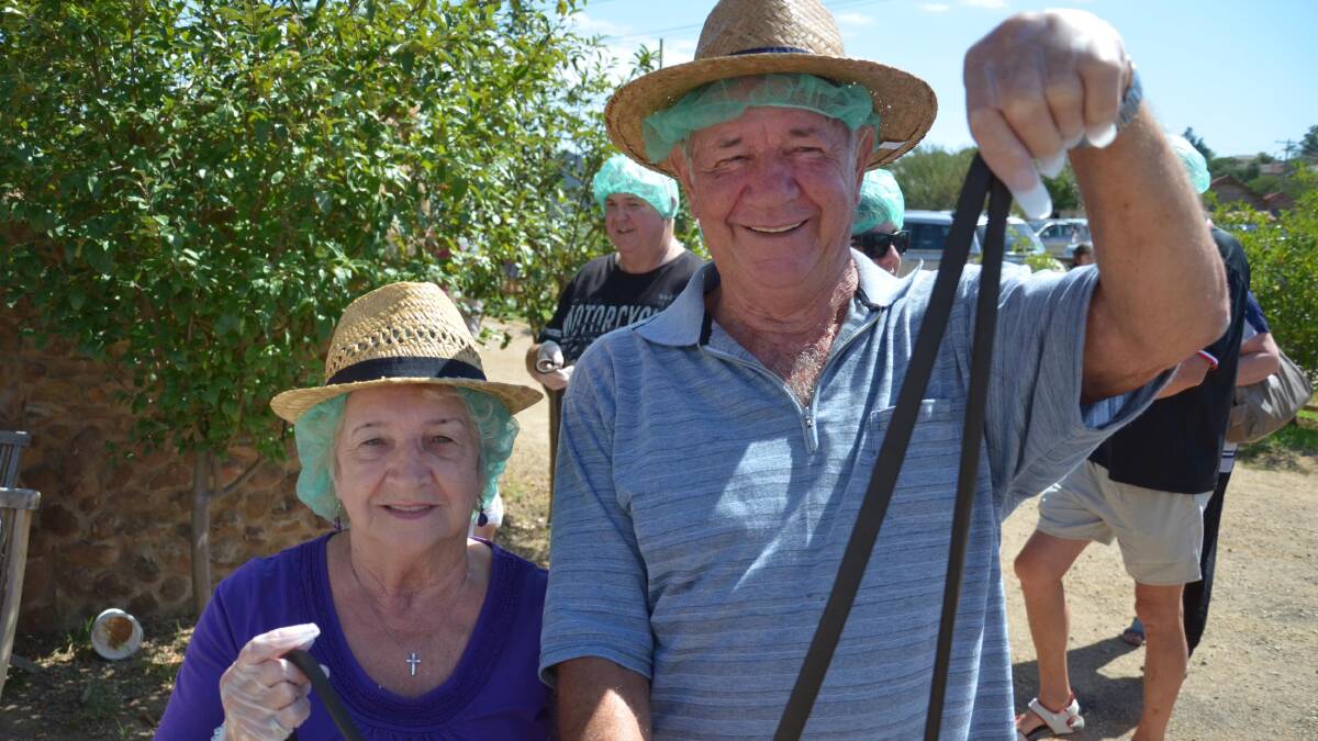 Patricia and Darrell Hawkins with their spoils from the record attempt. Picture: Declan Rurenga