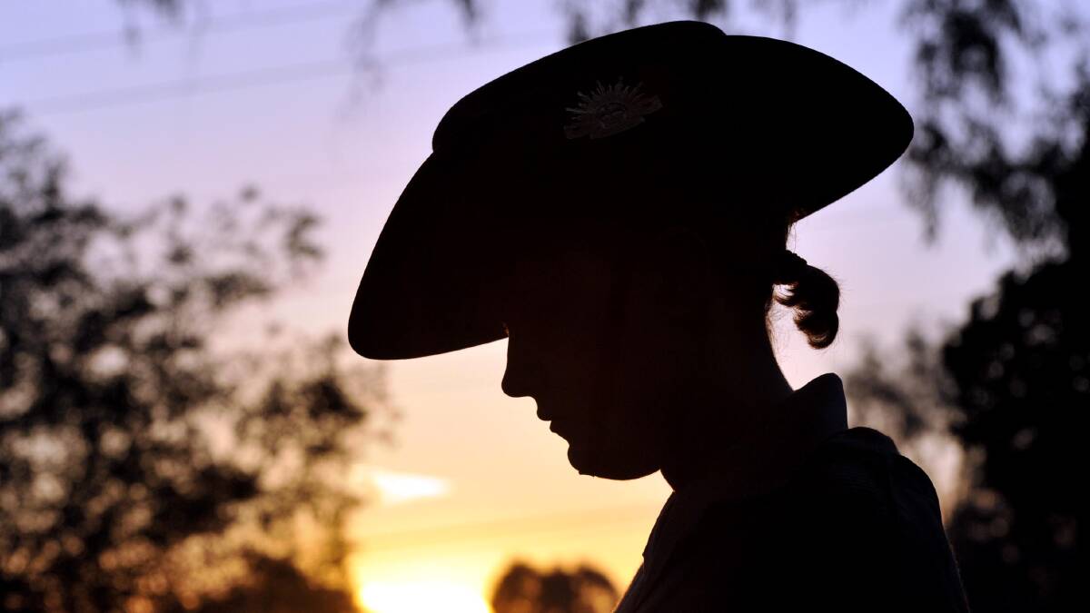 Cadet Alice Quinn of the 219 Wagga army cadet unit serves as part of the catafalque party during the service at the Wagga War Cemetery. Picture: Les Smith