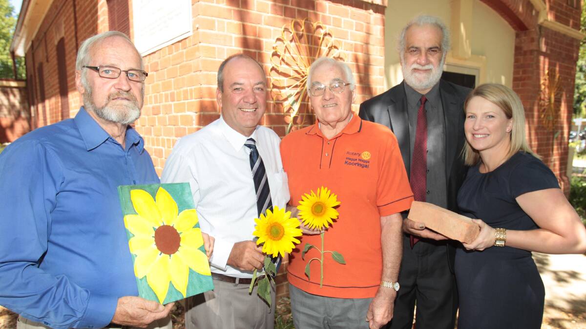 DONATIONS: Working for the benefit of Sunflower House are (from left) advisory board chairman Dr Ian McDonald, member for Wagga Daryl Maguire, advisory board secretary Dr Ray King, Wagga court registrar David Blackman and court client services officer Amy Westblade. Picture: Kieren L Tilly