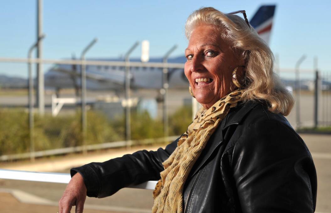 OPTIMISTIC: Jenny Hill at the Wagga airport waiting to catch a plane to Sydney. As she was about to board, Mrs Hill was told her kidney transplant operation had been cancelled. Picture: Michael Frogley