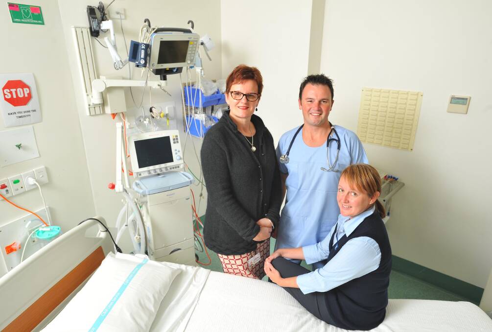 WELCOME: Wagga's doctor and nursing shortage may not yet be over, but reinforcements are arriving. Calvary Hospital has welcomed anaesthetist Dr Paul Nicholas as a visiting medical officer and his wife Kate (right), who has been appointed nurse unit manager of St Gerard's. They have moved to Wagga from Queensland. Another new appointment at Calvary is Robin Haberecht, director of clinicalservices. Picture: Kieren L Tilly