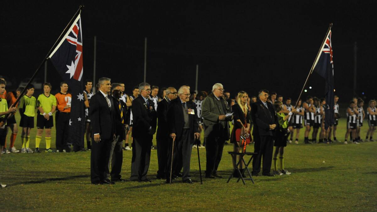 Veterans and representatives officially open the 2012 Anzac Challenge as TRYC and Marrar players line up before the game.