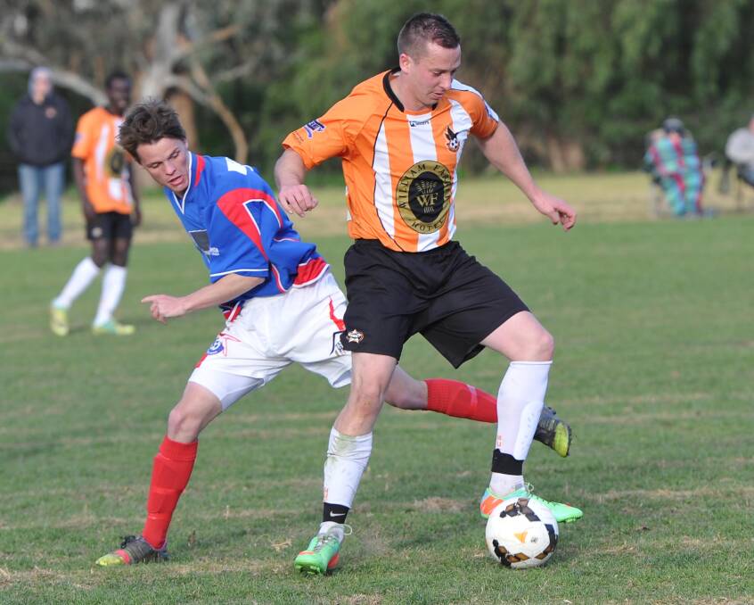 Wagga United player Zeph Daniel wrong-foots Henwood Park opponent Jordan Buik during the 1-0 win at Rawlings Park on Sunday. Pictures: Laura Hardwick