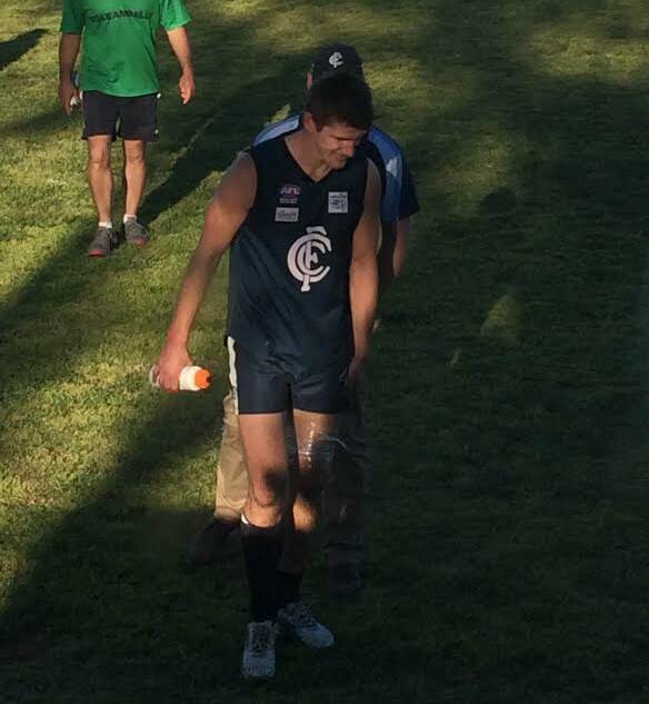 Coleambally ruckman-forward Dean Pound limps from Langtry Oval with ice on his left hamstring.