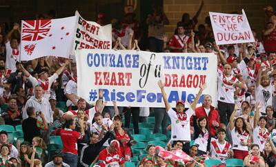 NRL fans "Rise for Alex" in support of injured Knights player Alex McKinnon
