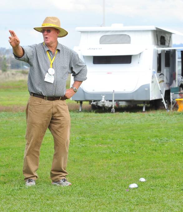 Shepparton's Peter Eade officiates the petanque competition at the Stone the Crows Festival. Picture: Kieren L Tilly
