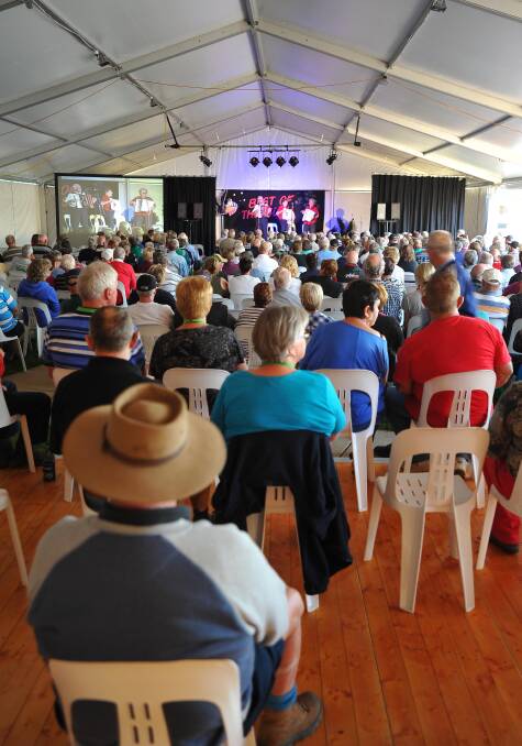 The crowd enjoys the Wagga Accordian Band in the big top during the official welcome of Wagga's Stone the Crows Festival on Thursday. Picture: Kieren L Tilly