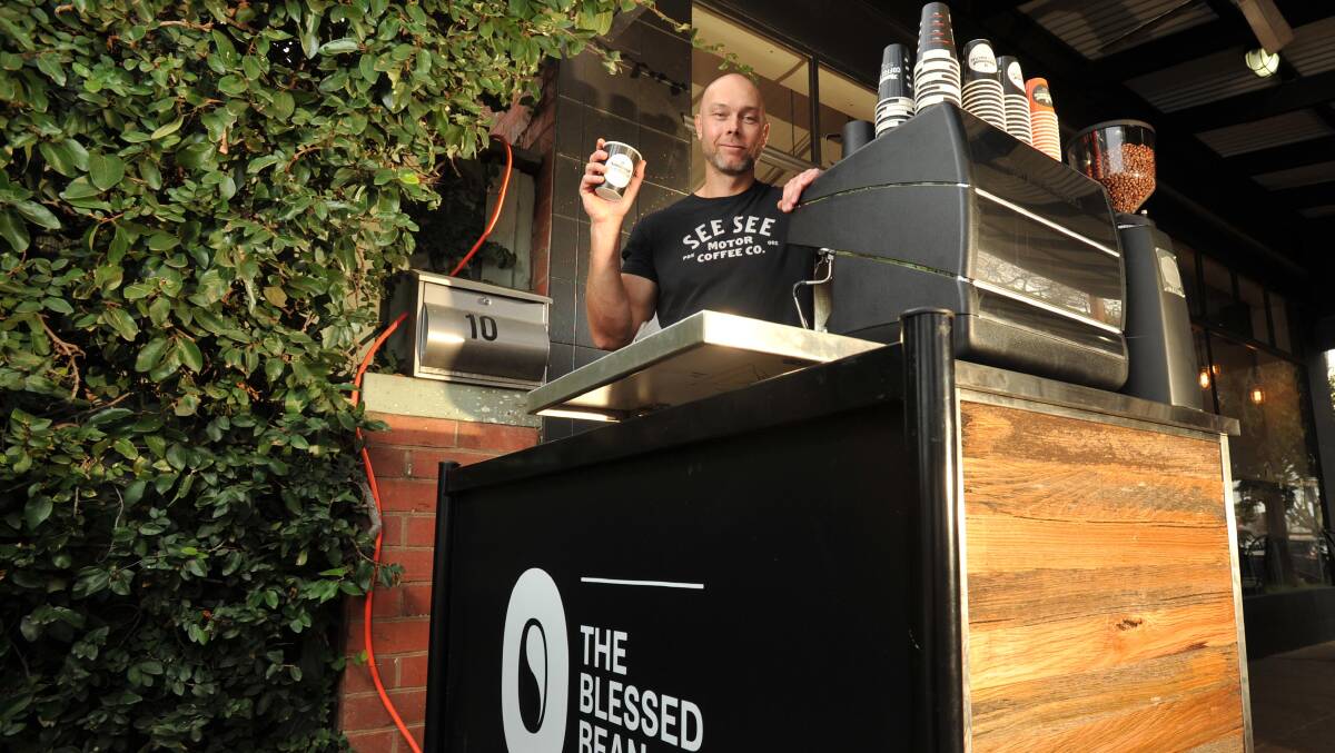 Blessed Bean proprietor Jason Dowding will unveil the cafe's new coffee cart outside the Best Street store on Tuesday. Picture: Michael Frogley