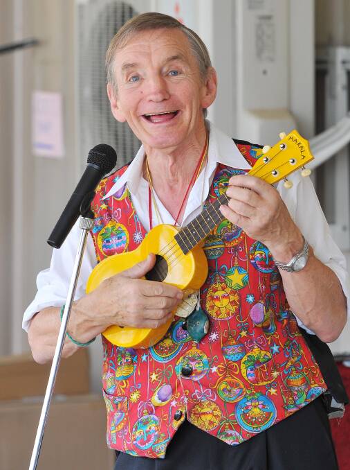 Ukulele player Mike Jackson stops for a photo during a workshop at the Stone the Crows Festival on Good Friday. Picture: Kieren L Tilly