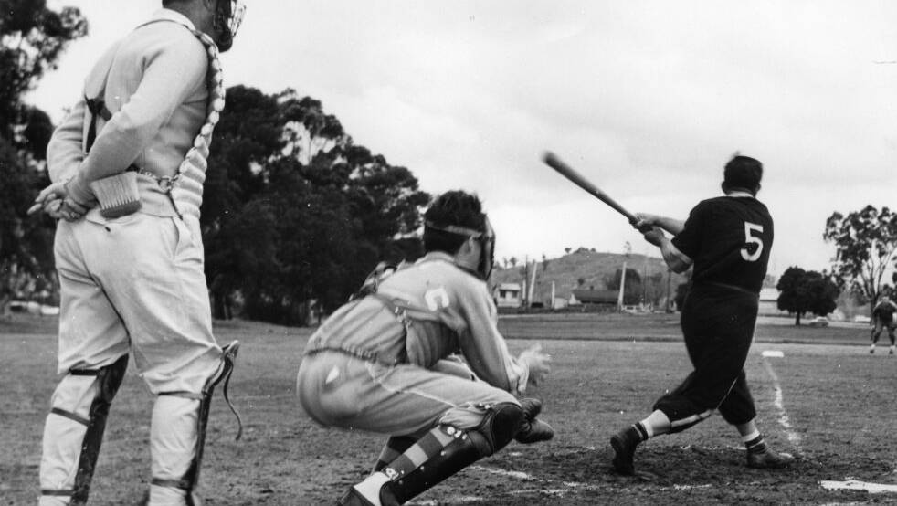 A competition game played at Bolton Park during the 1960s. The catcher is a member of the Wagga Teachers’ College Team. Note: the brush in the umpire’s back pocket is used to dust off the home plate (Tom Lennon Collection RW1574/274/1022).