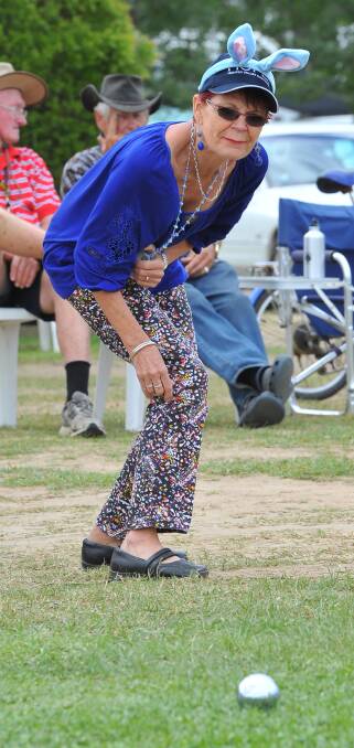 Helen Bailey, from Lismore, participates in the petanque competition. Picture: Kieren L Tilly