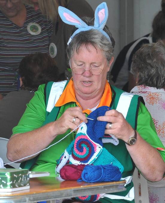 Jan Gursanscky keeps her crochet hook busy during day two of Wagga's Stone the Crows Festival on Tasman Road. Picture: Kieren L Tilly