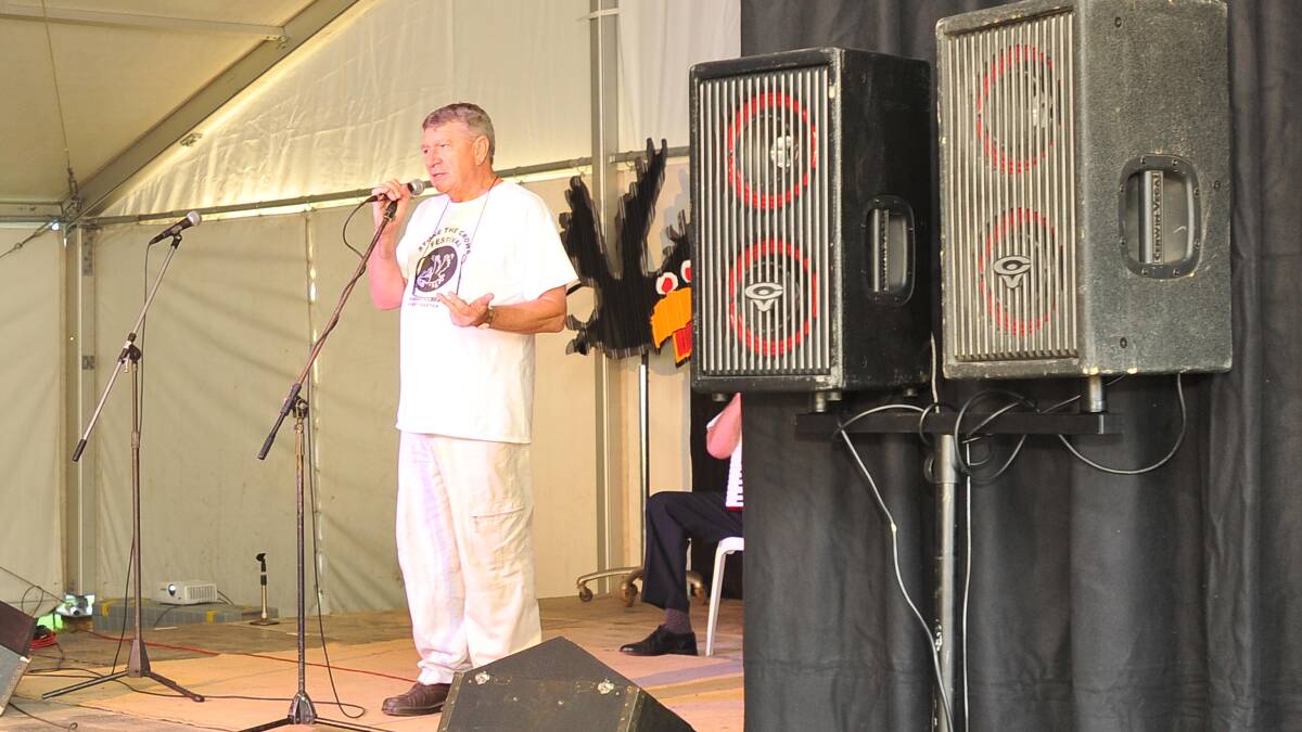 Stone the Crows co-organiser Jim Haynes welcomes the crowd to the festival on Thursday. Picture: Kieren L Tilly 