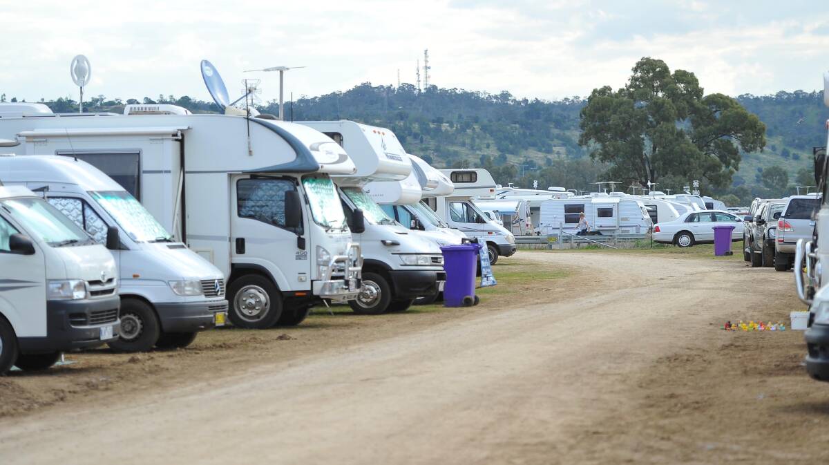 Caravans, camper vans and tents line the property hosting the Stone the Crows Festival on Tasman Road. Picture: Kieren L Tilly